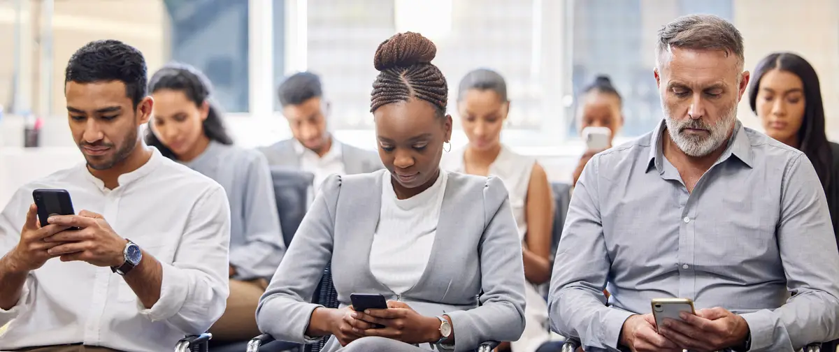 Business people seminar and smartphones in meeting with presentation for company in executive boardroom Team waiting and banner convention for training or teamwork with corporate tradeshow