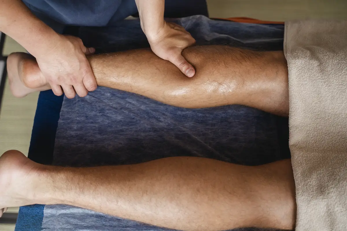 Top view man massaging patient