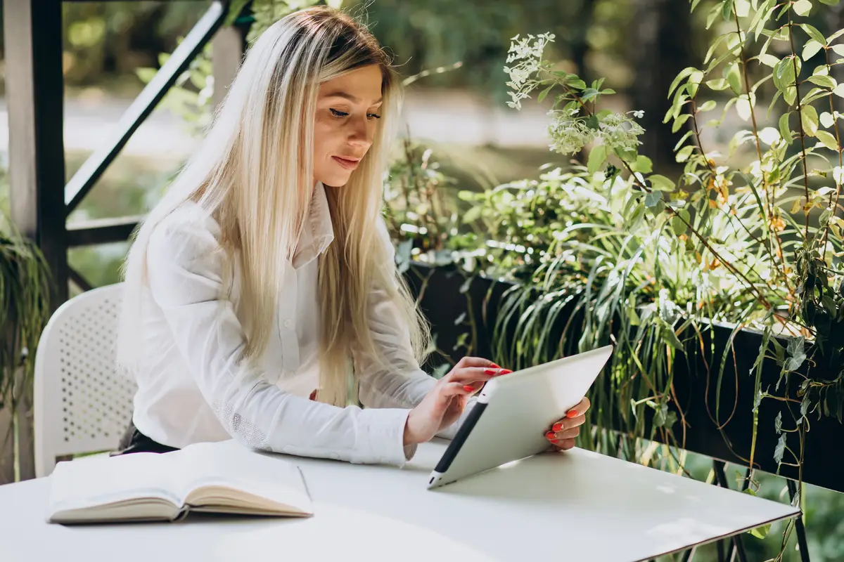 Business woman working on tablet