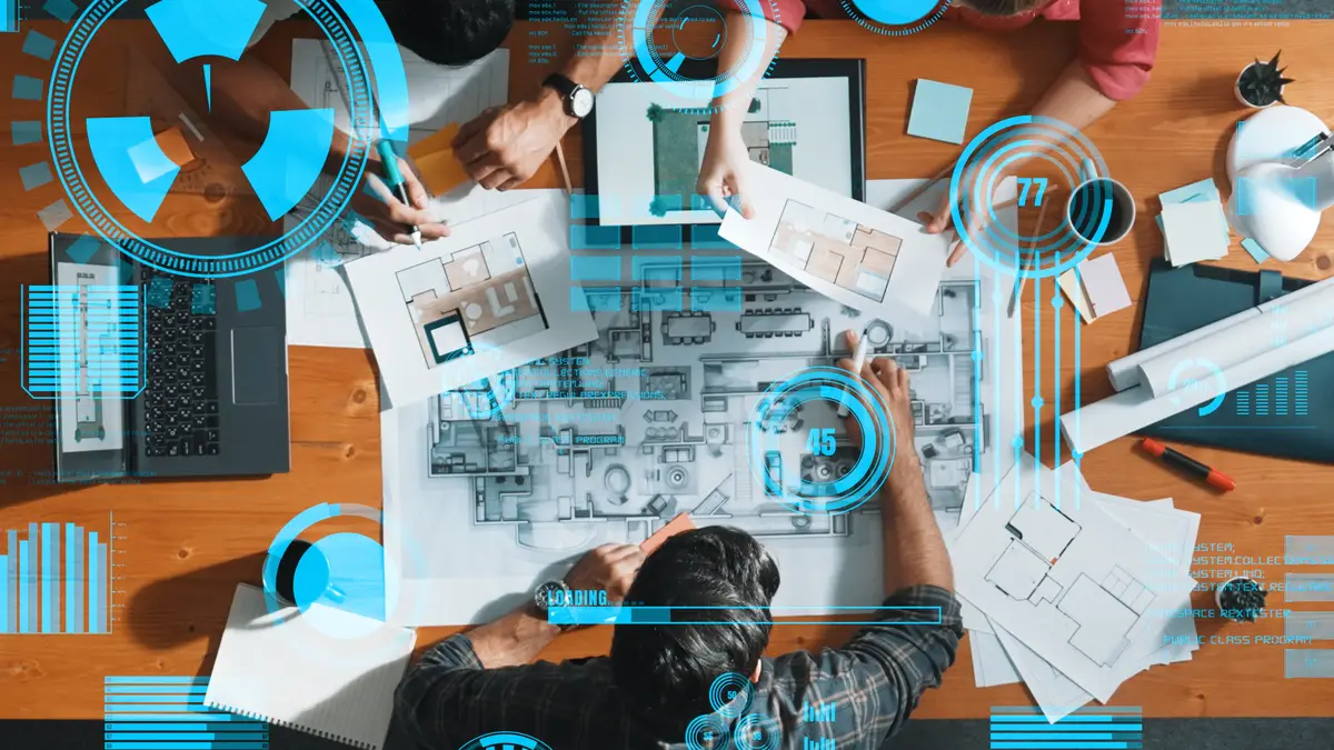 Top down view of civil engineer planning and writing at blueprint symposium