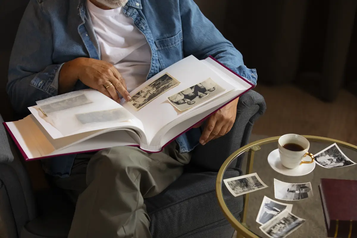 People looking over picture album