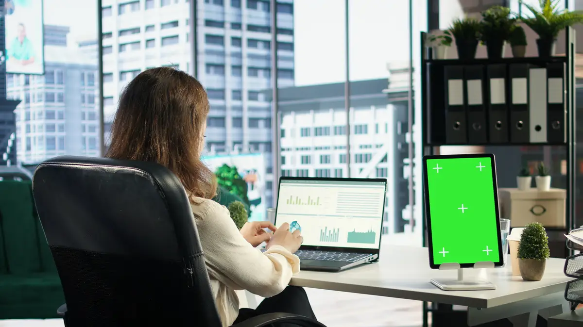 General director using chroma key template on modern gadget