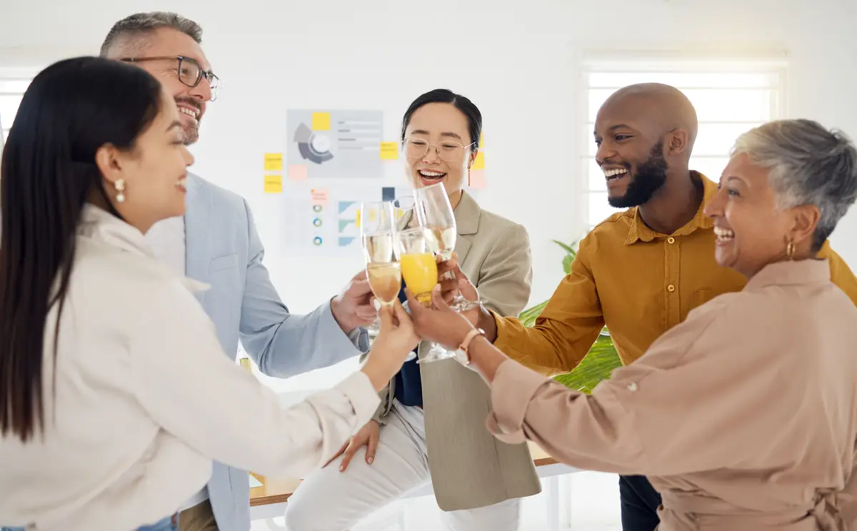 Teamwork champagne and toast with business people in office for winner celebration and support Success party and friends with employees and cheers for community achievement and congratulations