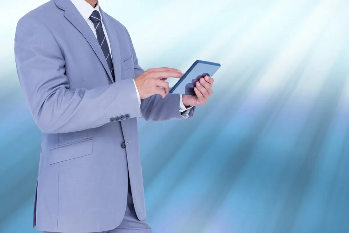 Stylish executive with his tablet