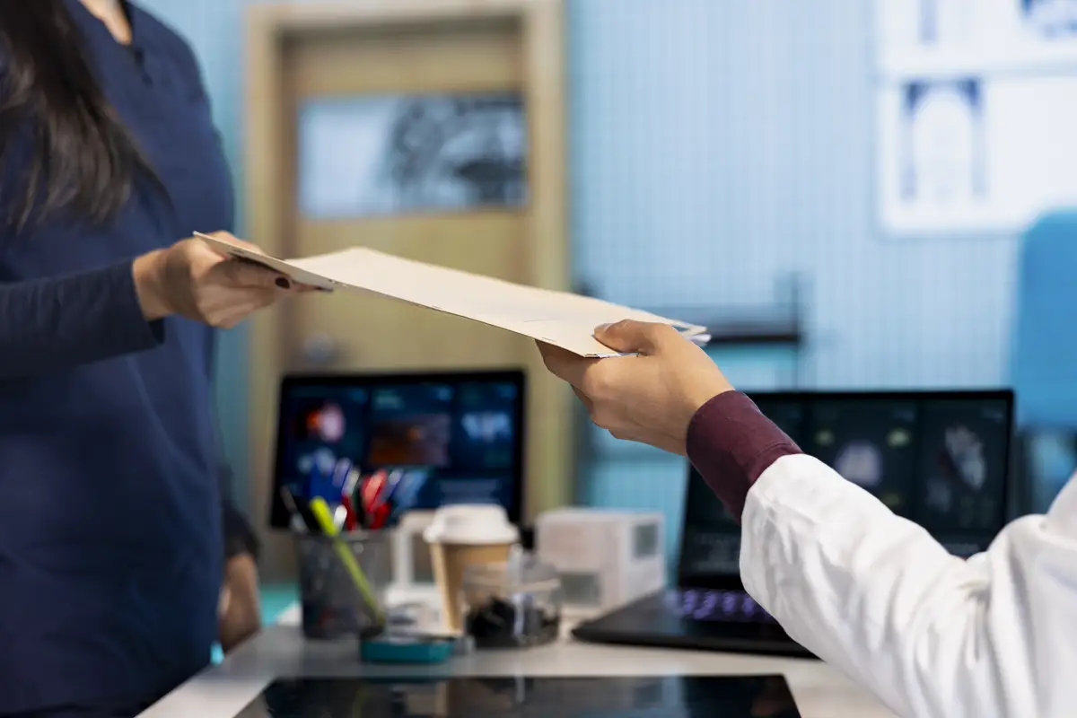 Indian healthcare professional sharing medical expertise with patient in office