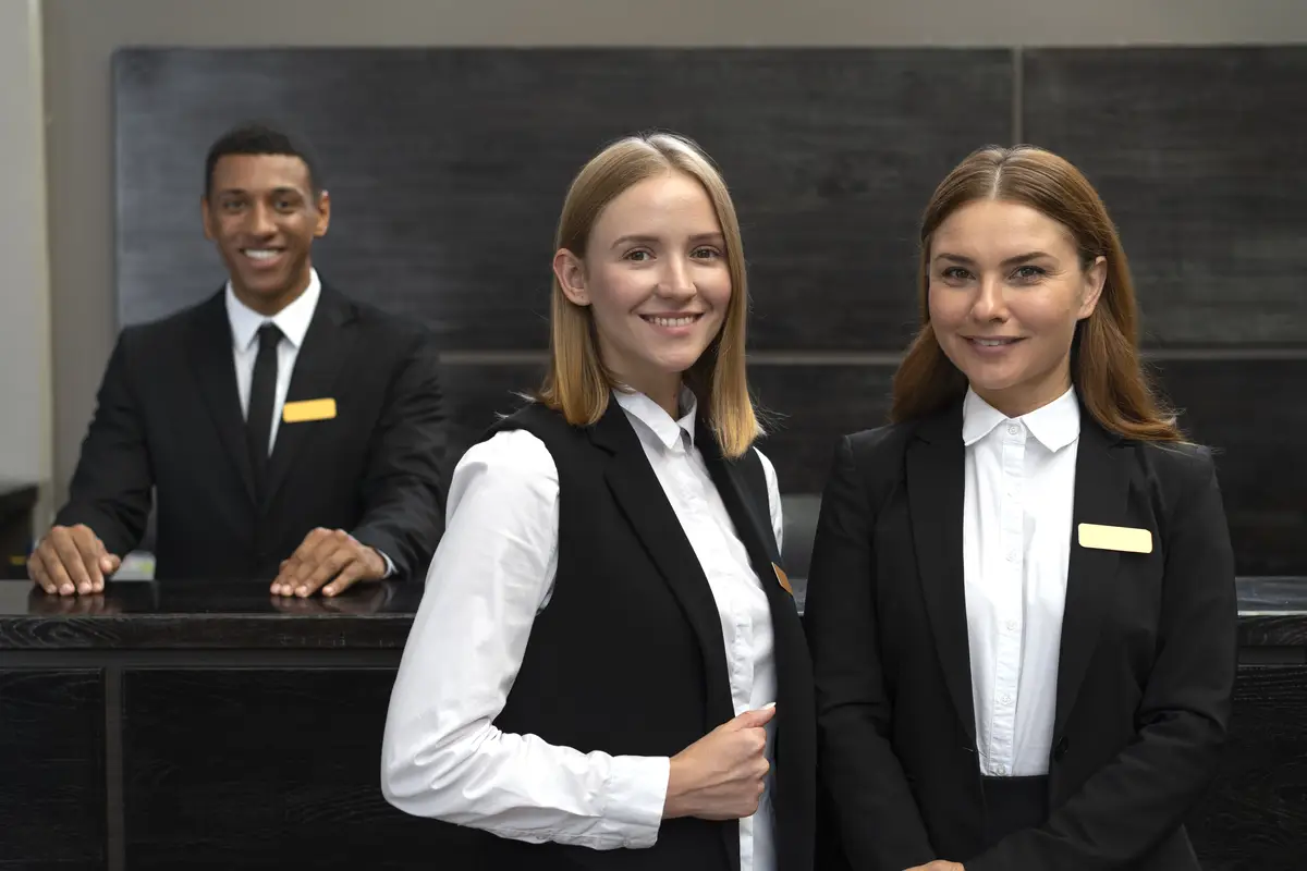 Receptionists at work in elegant suits