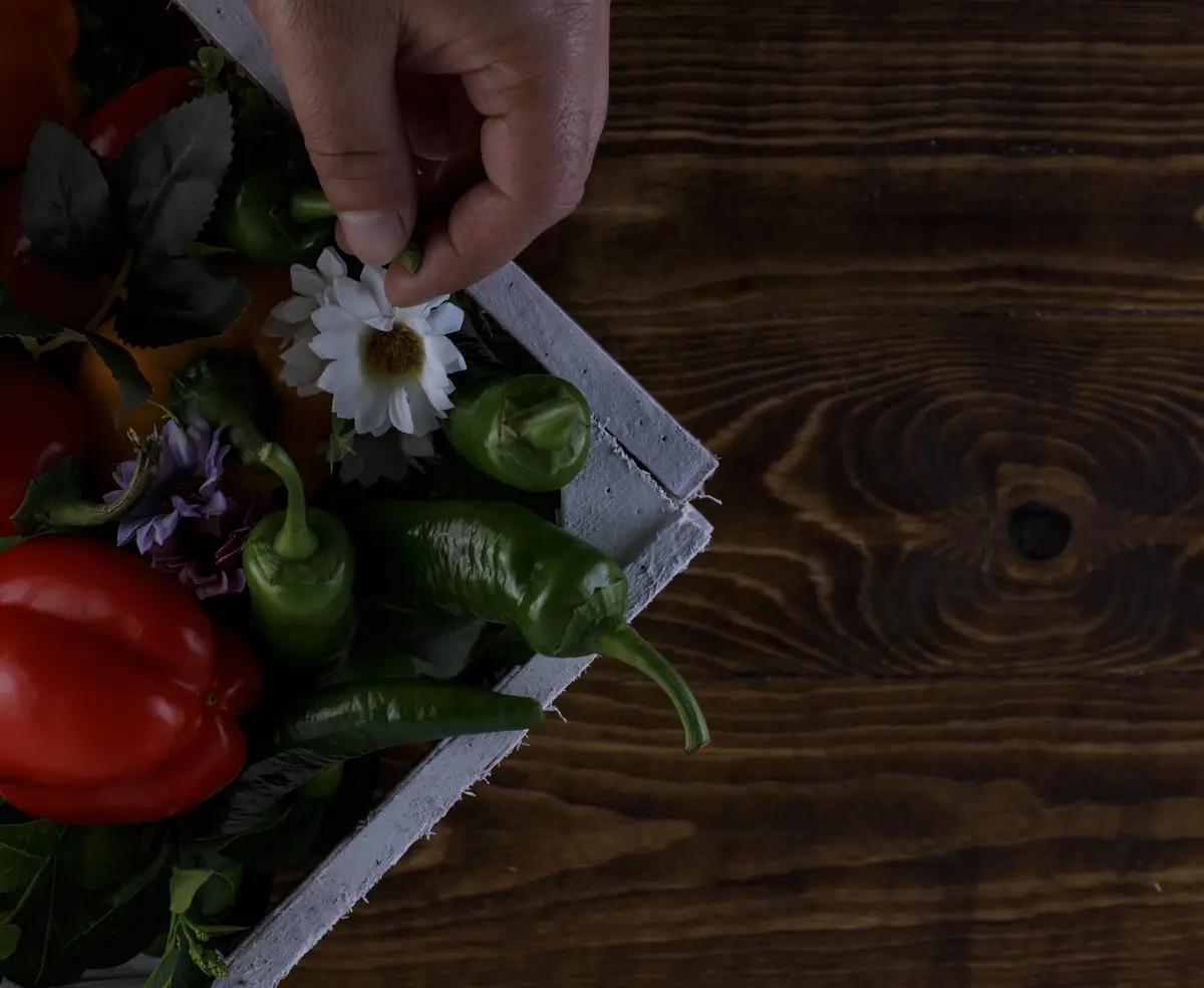 High angle view of hand holding bouquet on table