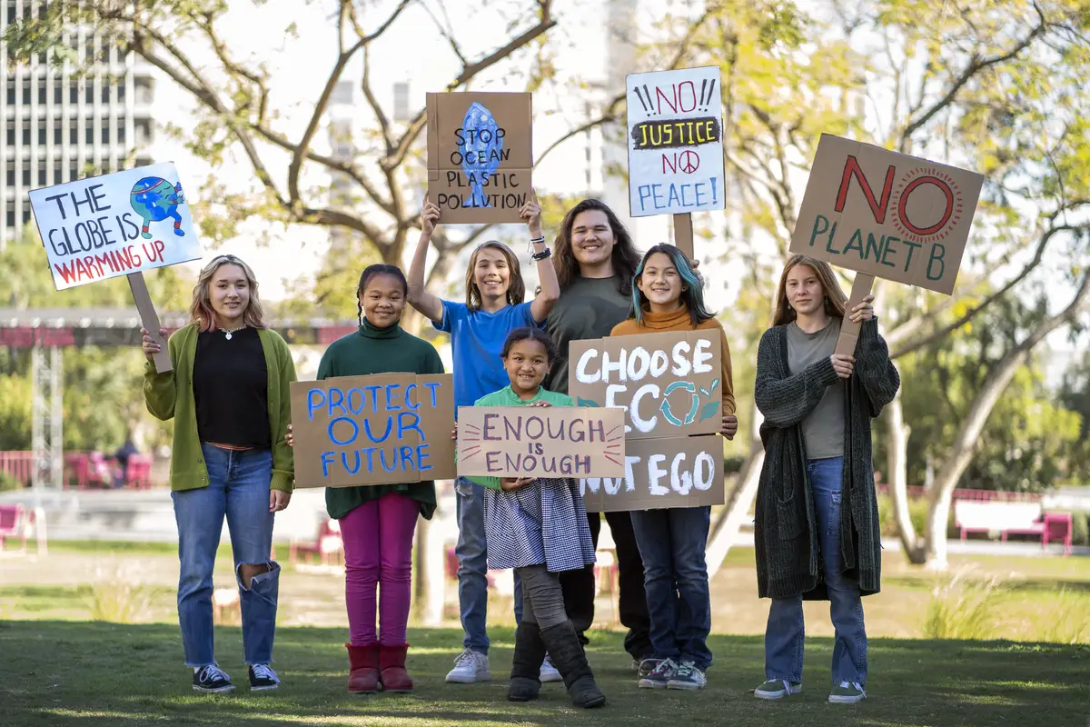 People at a world environment day protest with placards