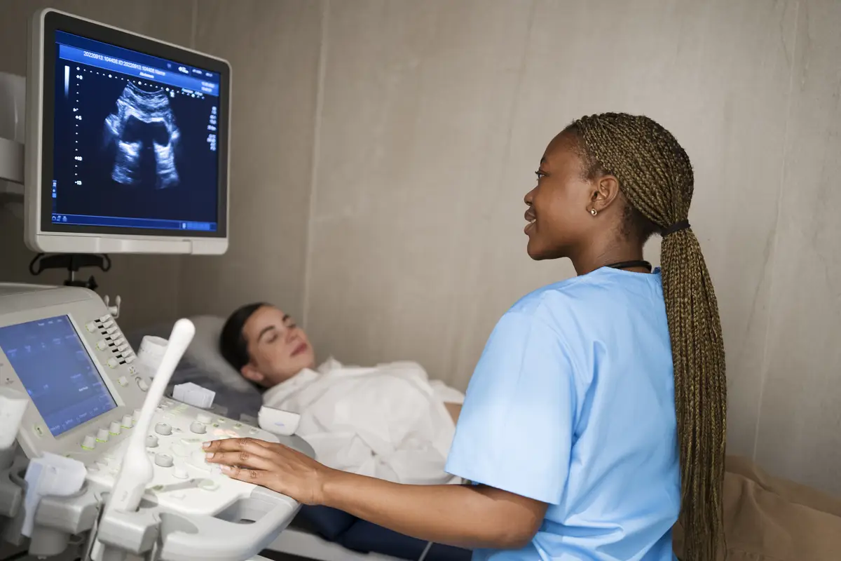 Nurse wearing scrubs while working at the clinic