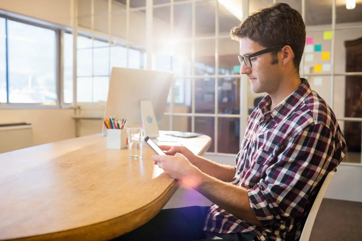 Colleagues using technology