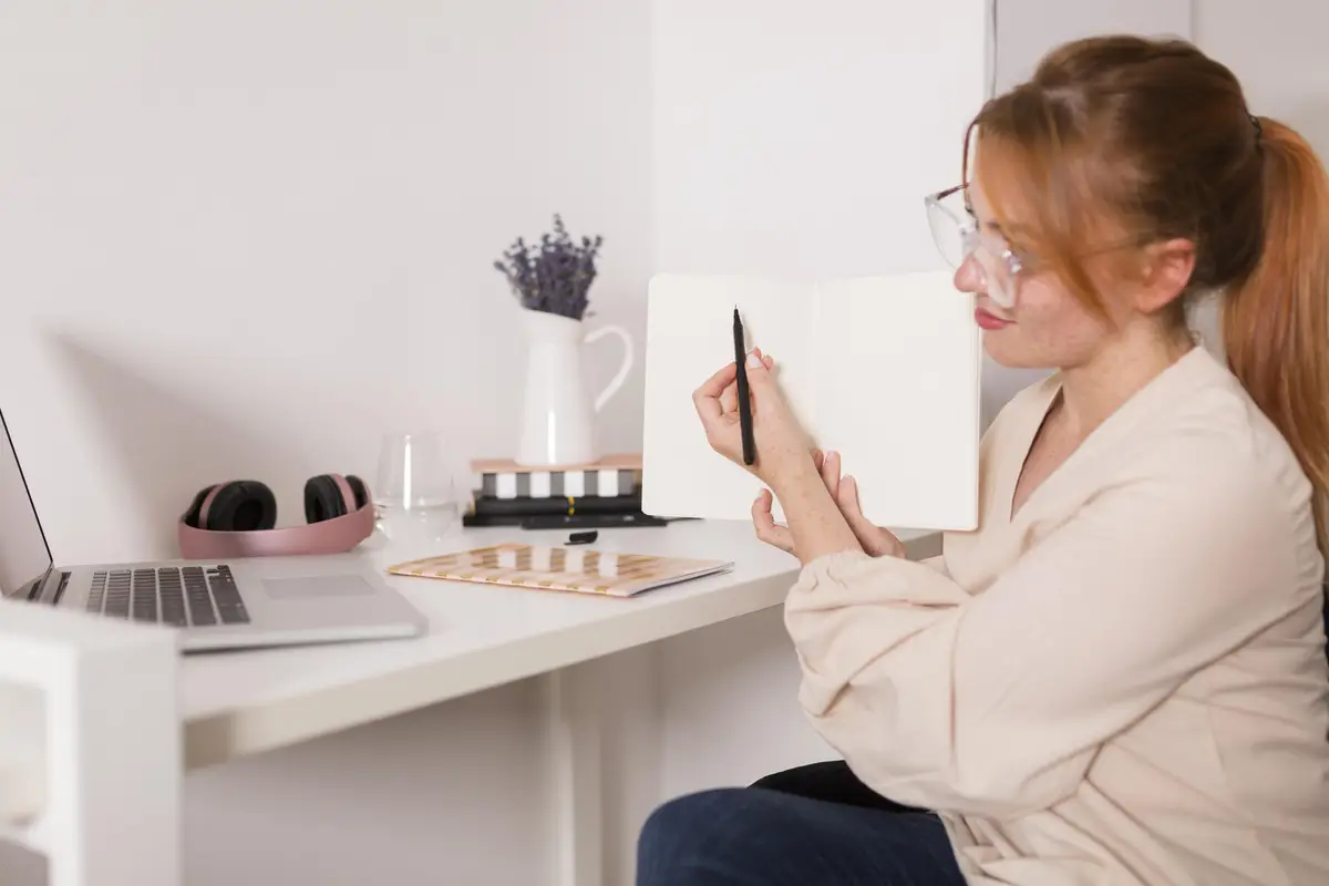 Side view of female teacher showing students the lesson during online class