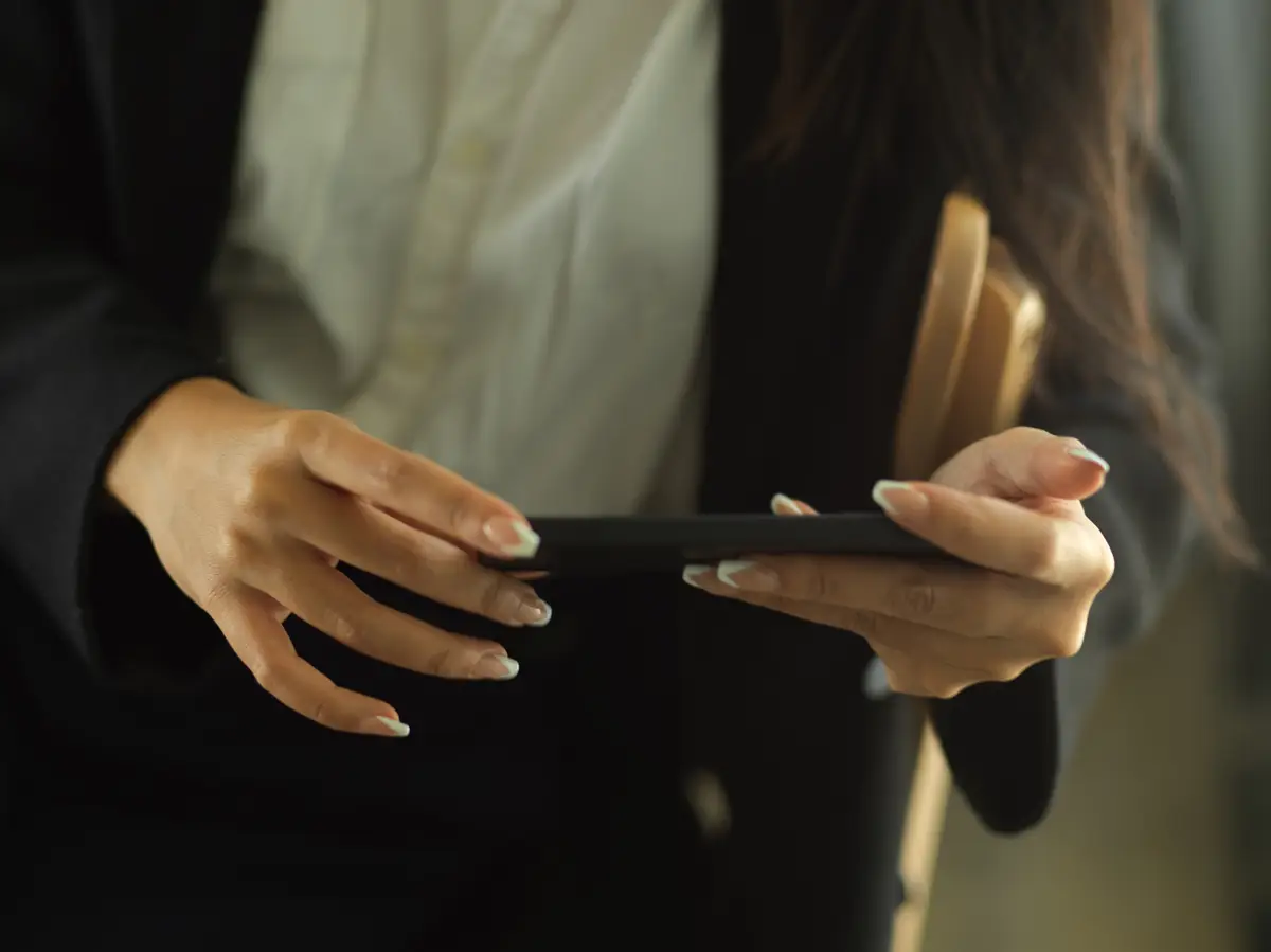 Close-up of woman holding hands