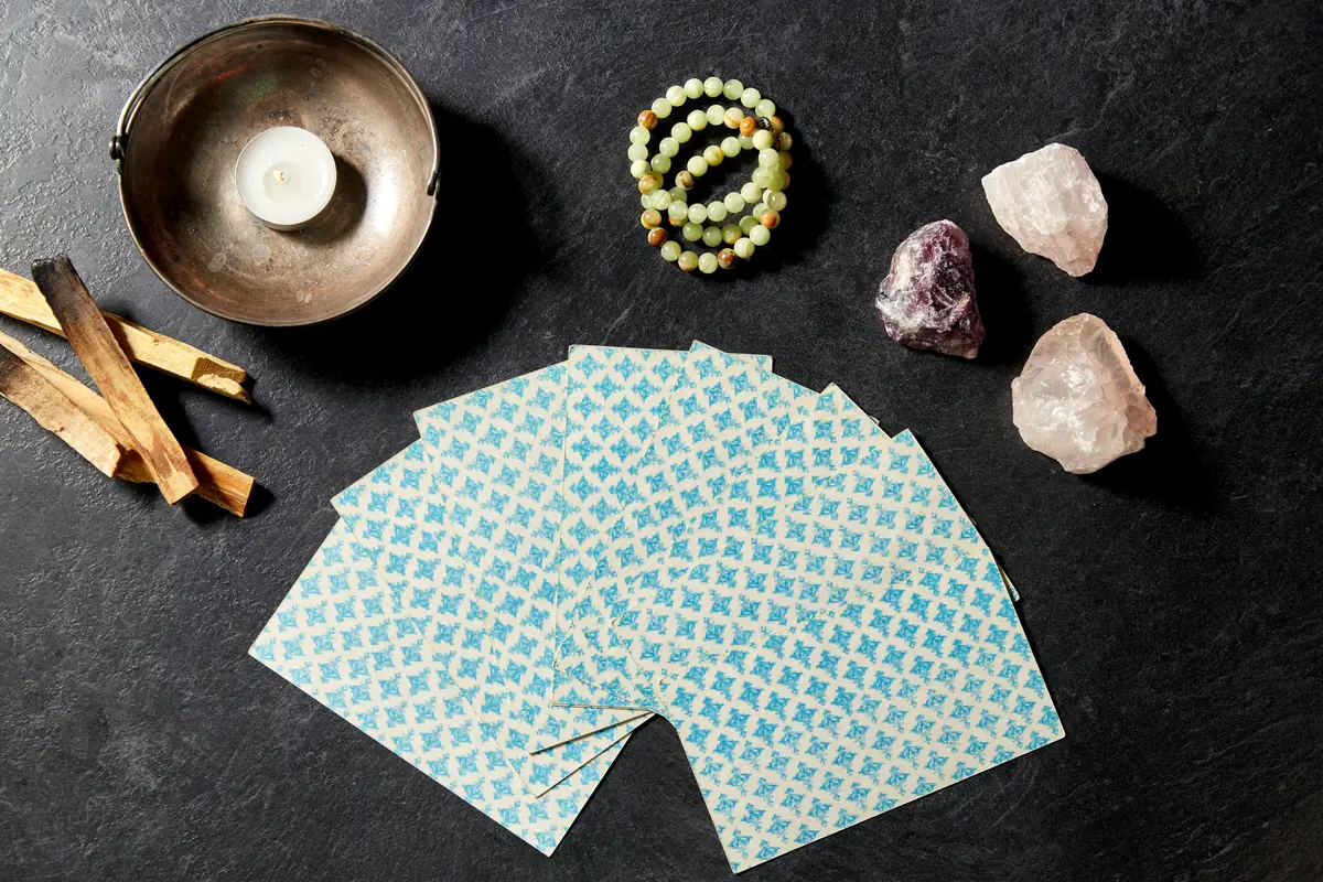tarot cards and magic staff for divination ritual