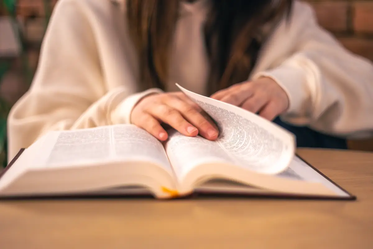 Bible closeup christianity concept reading the holy bible bible in womens hands