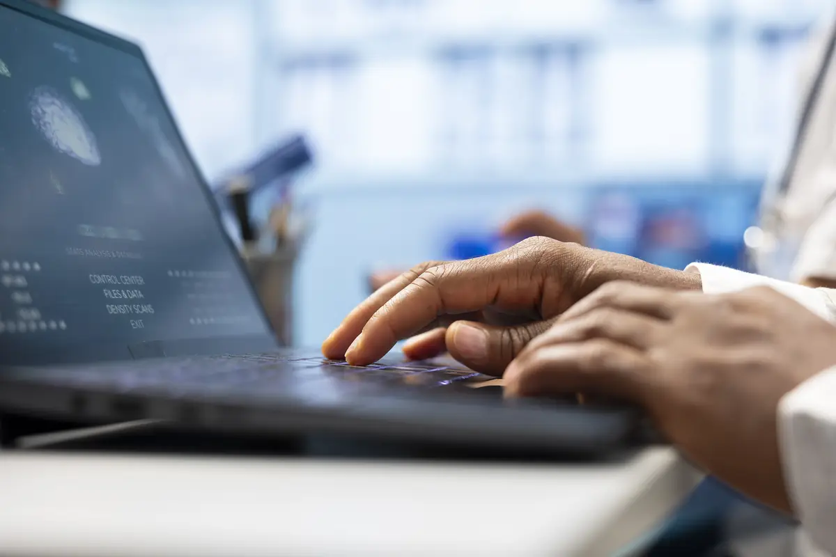 Medical professionals meeting in a private clinic to review healthcare data