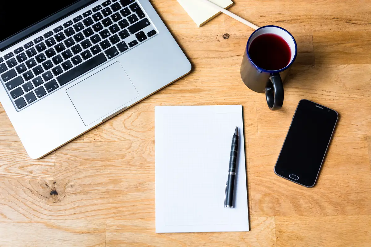 High angle view of black coffee cup on office desk