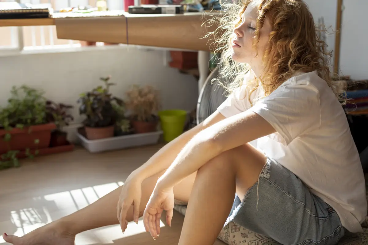 Side view woman with closed eyes