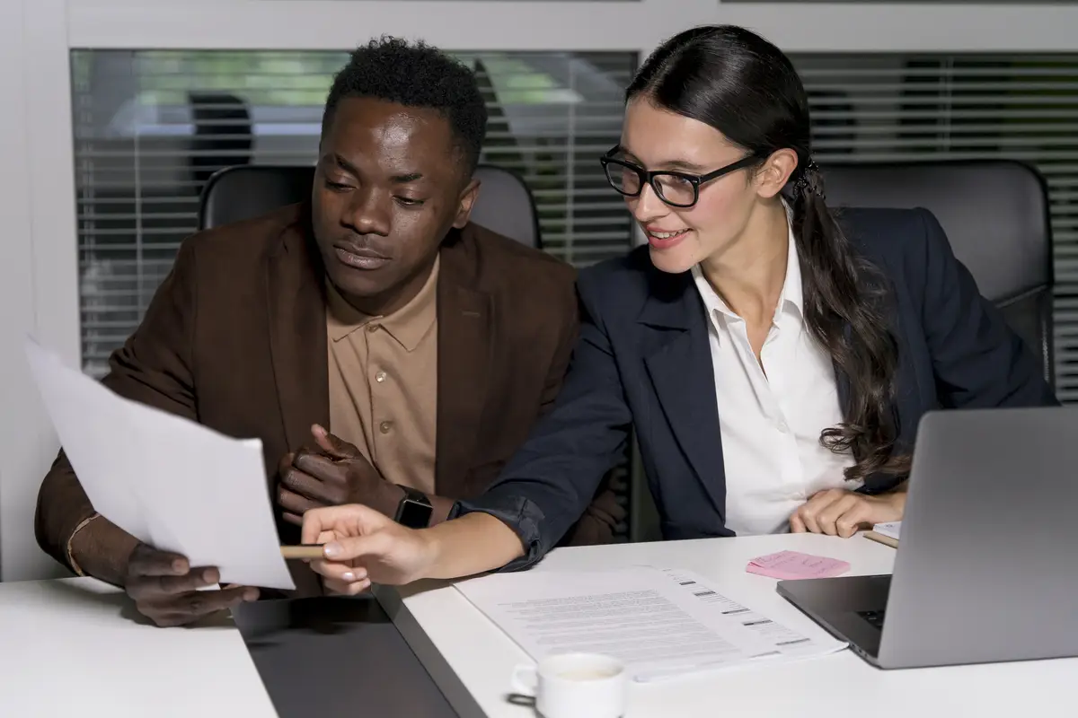 Business teammates working late