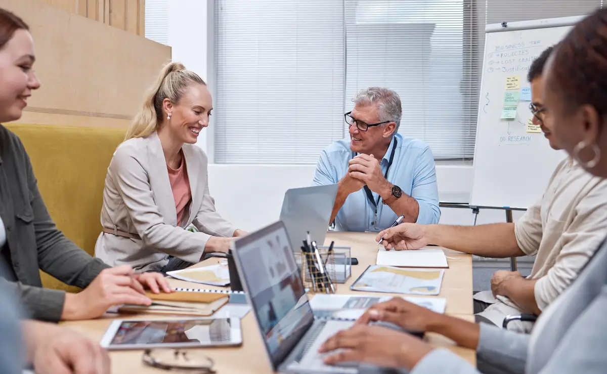 Dont be shy to share your ideas Shot of a diverse group of businesspeople sitting together in the office and having a meeting