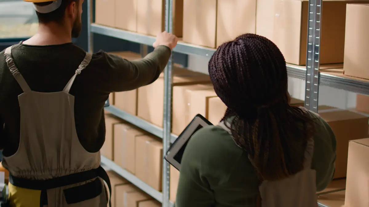 Staff members preparing warehouse orders