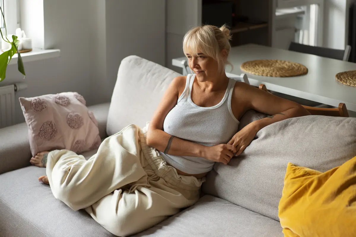 Full shot woman chilling at home