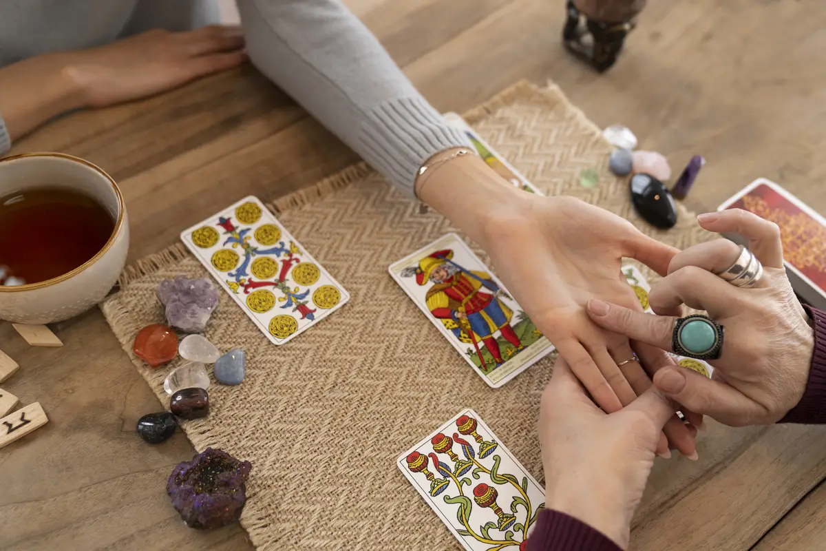 High angle woman reading tarot