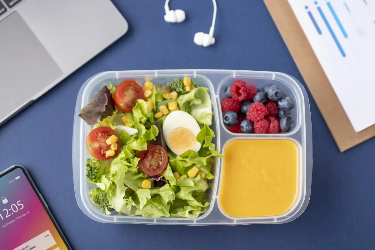 Close up on lunchboxes with delicious food
