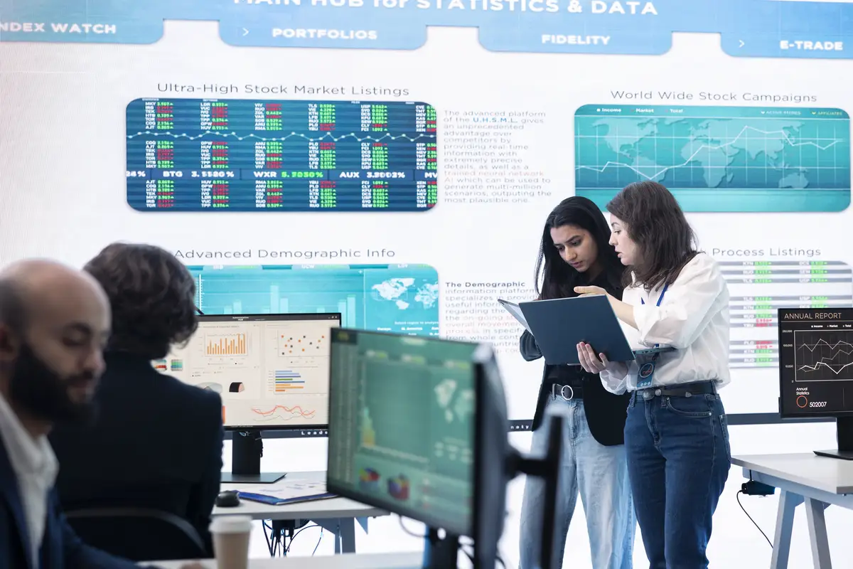 Professional forecast affiliates group work in monitoring room