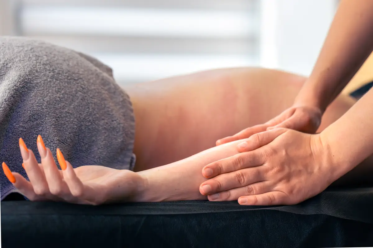Forearm massage in daylight spa long gliding strokes for relax