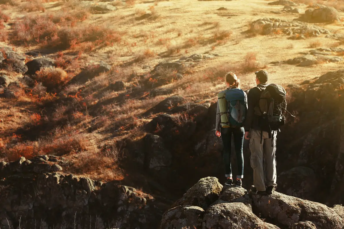 Man and woman on the top of the mountain