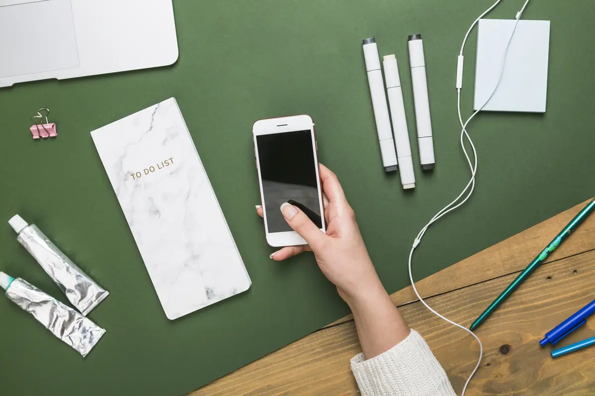 Office desktop with mobile phone