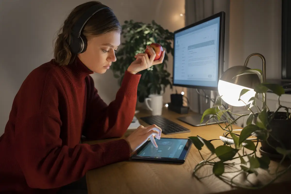 Person working late at night on the computer at home