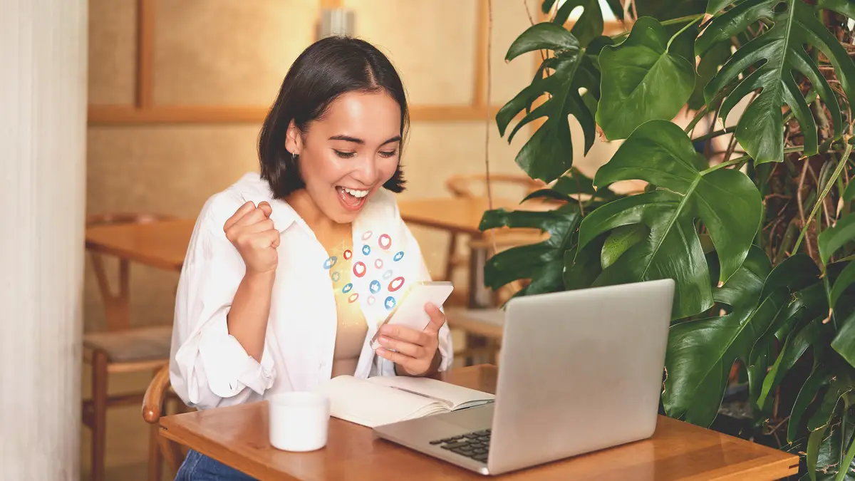 Asian woman interactions on mobile phone concept with notification icons of like message email comment and star above smartphone screen person hands holding device internet digital marketing