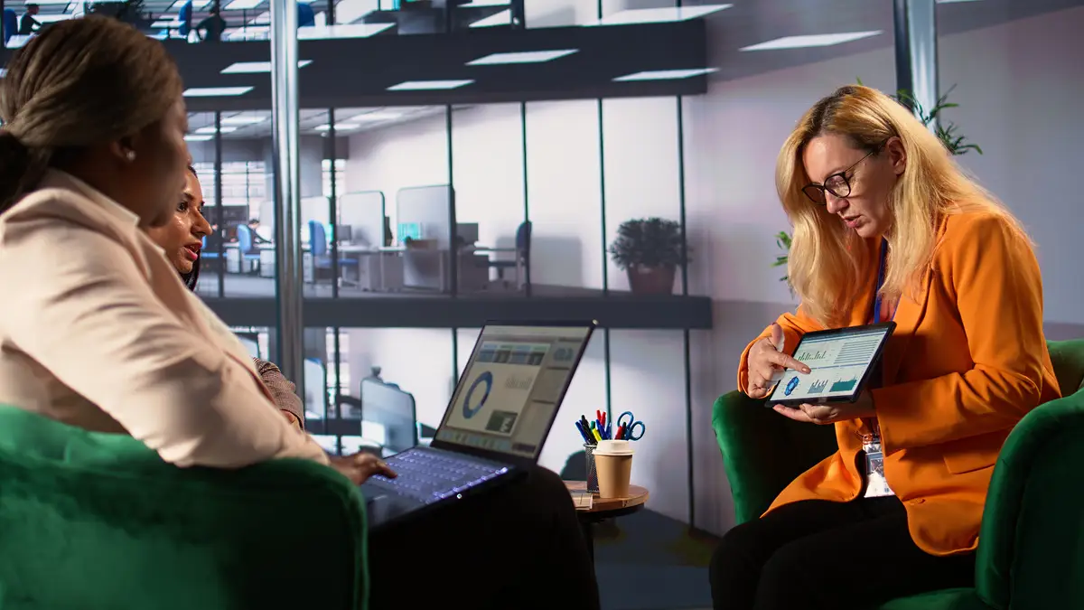 Multiethnic women leaders in a meeting brainstorming marketing strategy