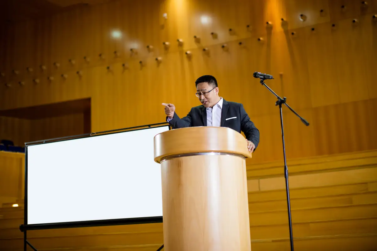 Male business executive giving a speech