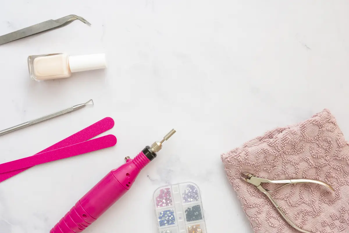 Top view nails care elements assortment with copy space