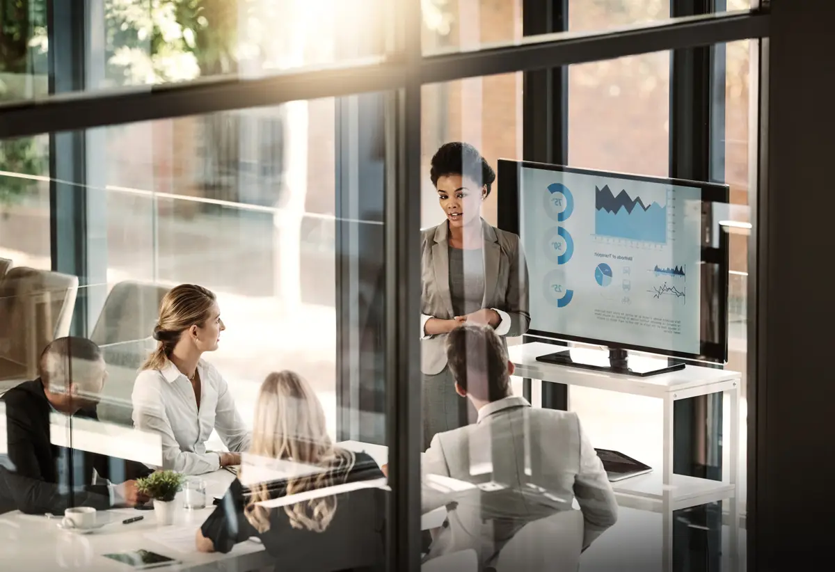 Business meeting people and budget review with speaker data analytics and statistics for company report Presenter teamwork and financial audit with fintech for graphs and communication in office