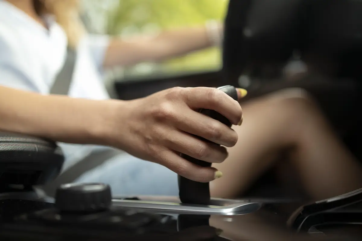 Woman traveling with her car