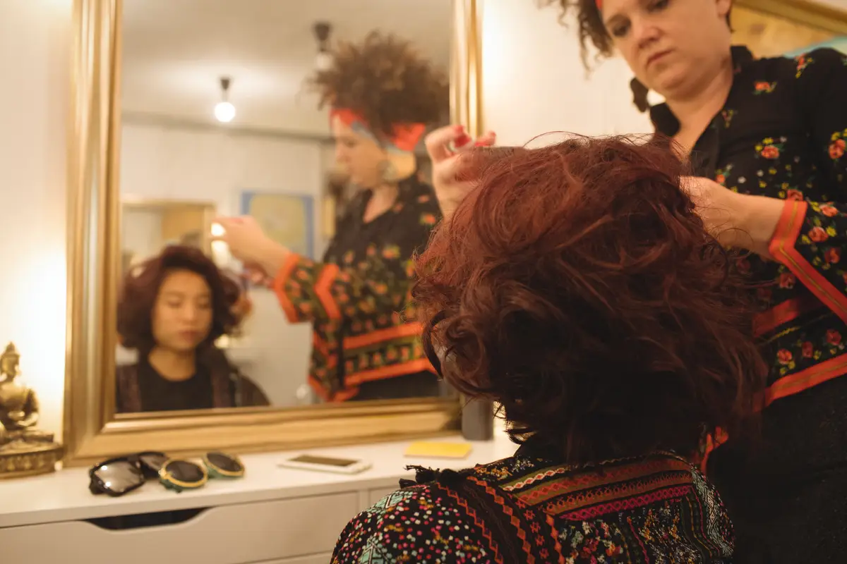 Stylish woman getting her hair done
