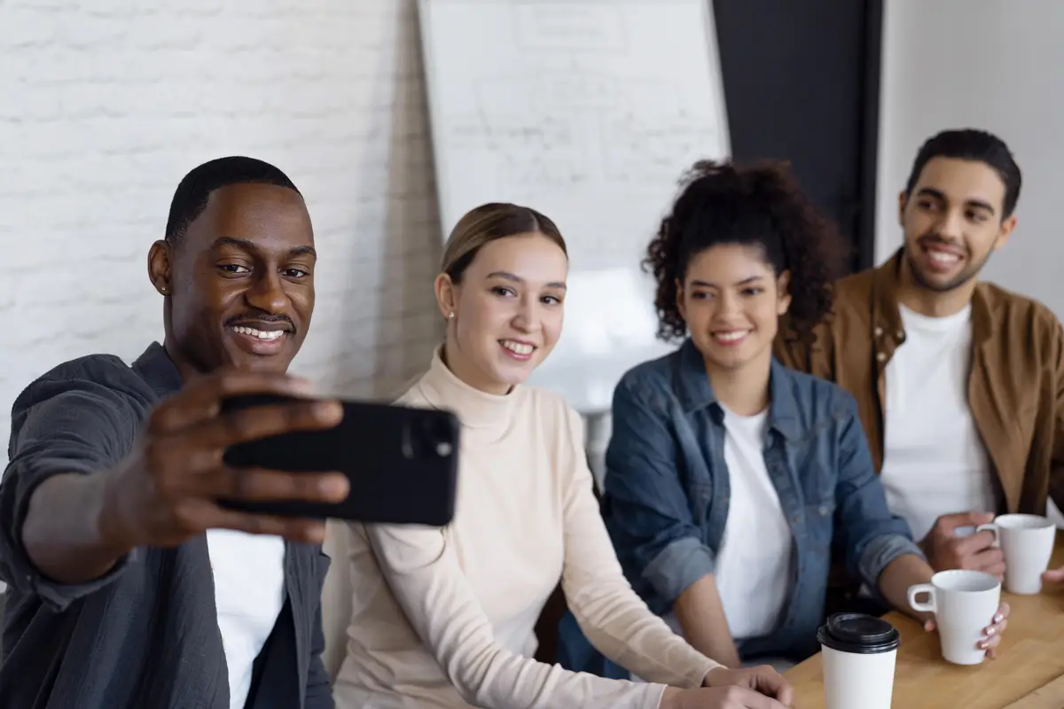 Medium shot business people taking selfie