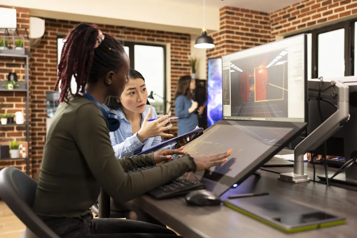 Diverse women working on graphic designs