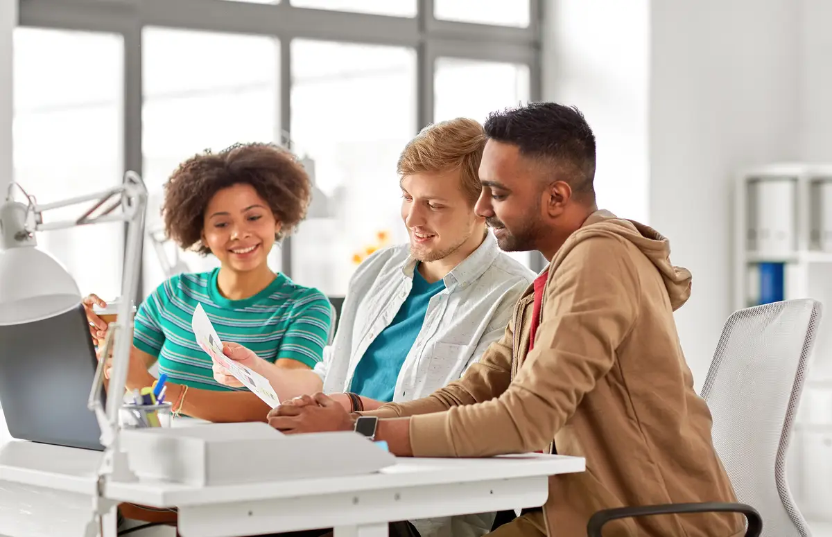 team working on user interface design at office