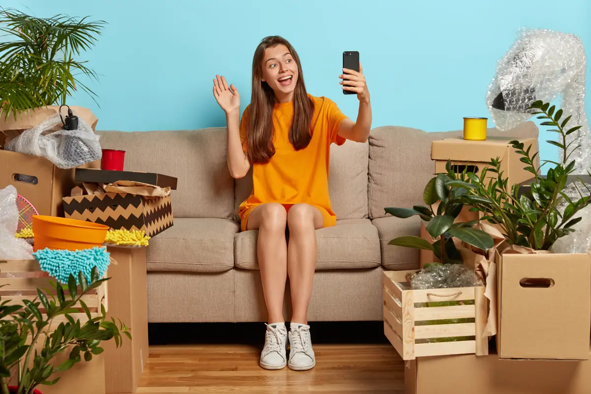 Friendly looking cheerful woman makes video call