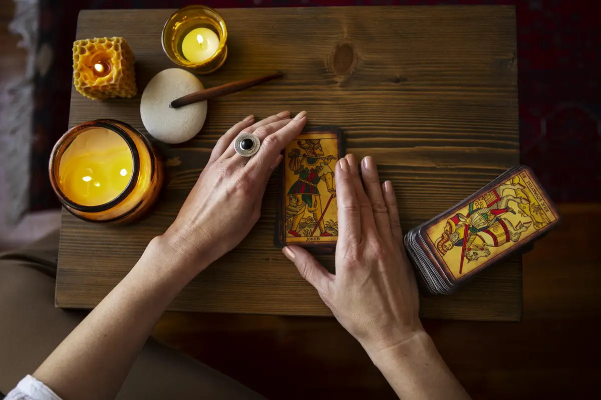 Top view woman reading tarot