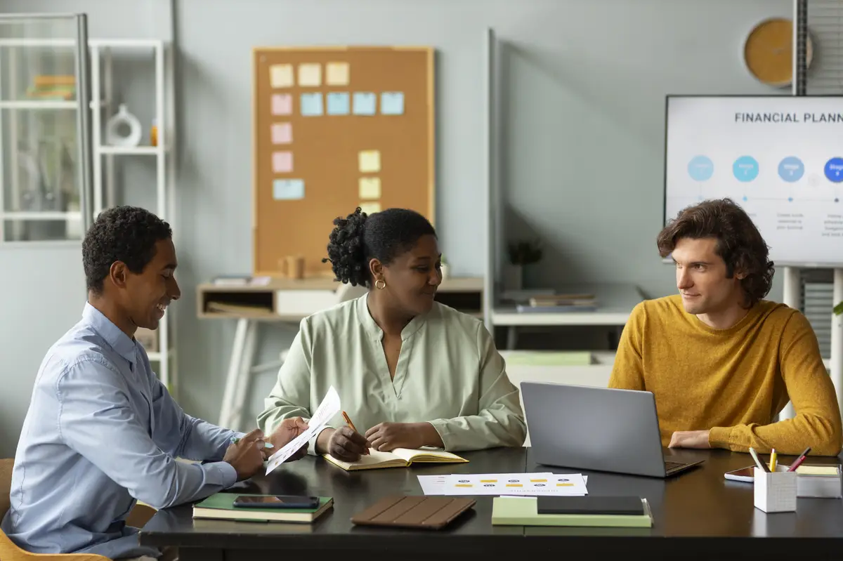 Colleagues working at office medium shot