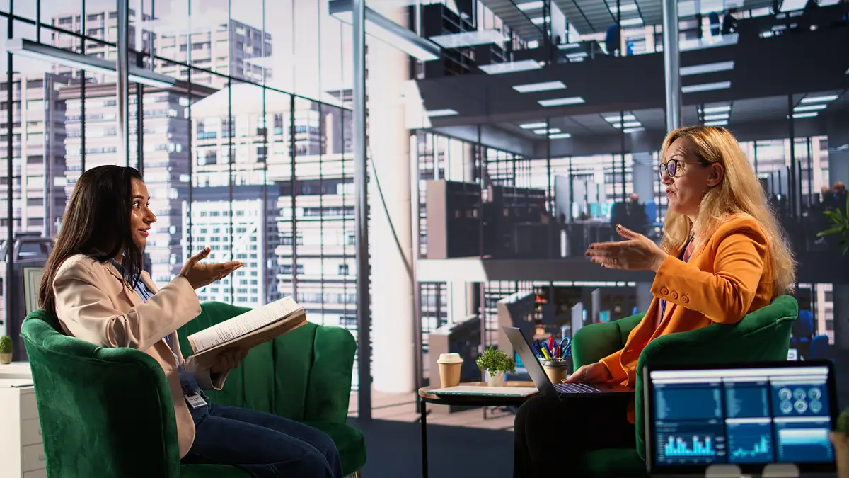 Team of business directors meeting to evaluate performance metrics for employees