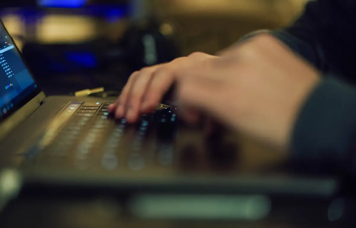 Close up of a hands of a businessman on a keyboard