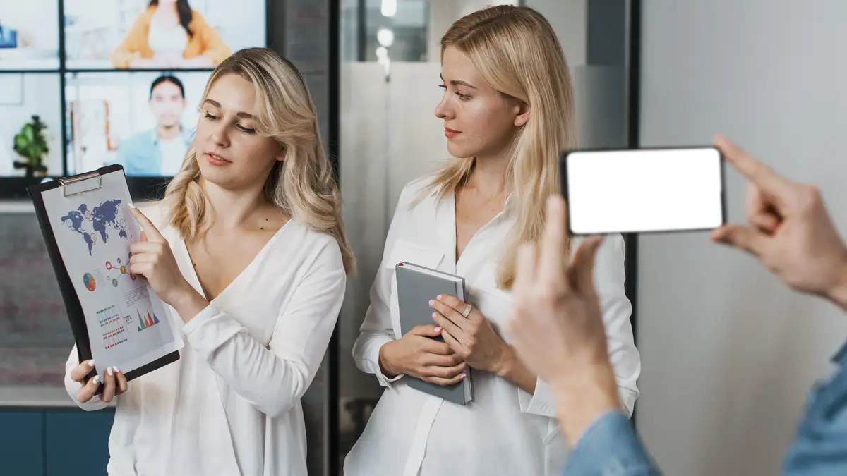 Beautiful businesswomen and copy space mobile phone