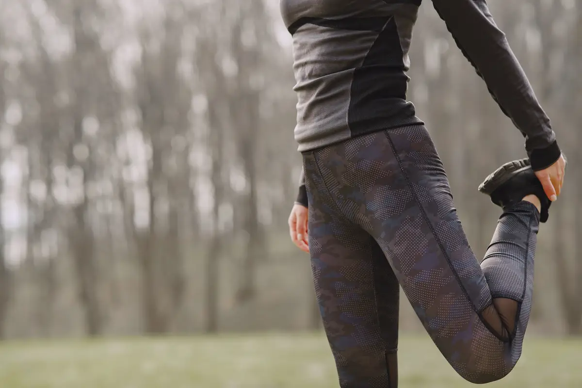 Masked woman training during coronavirus