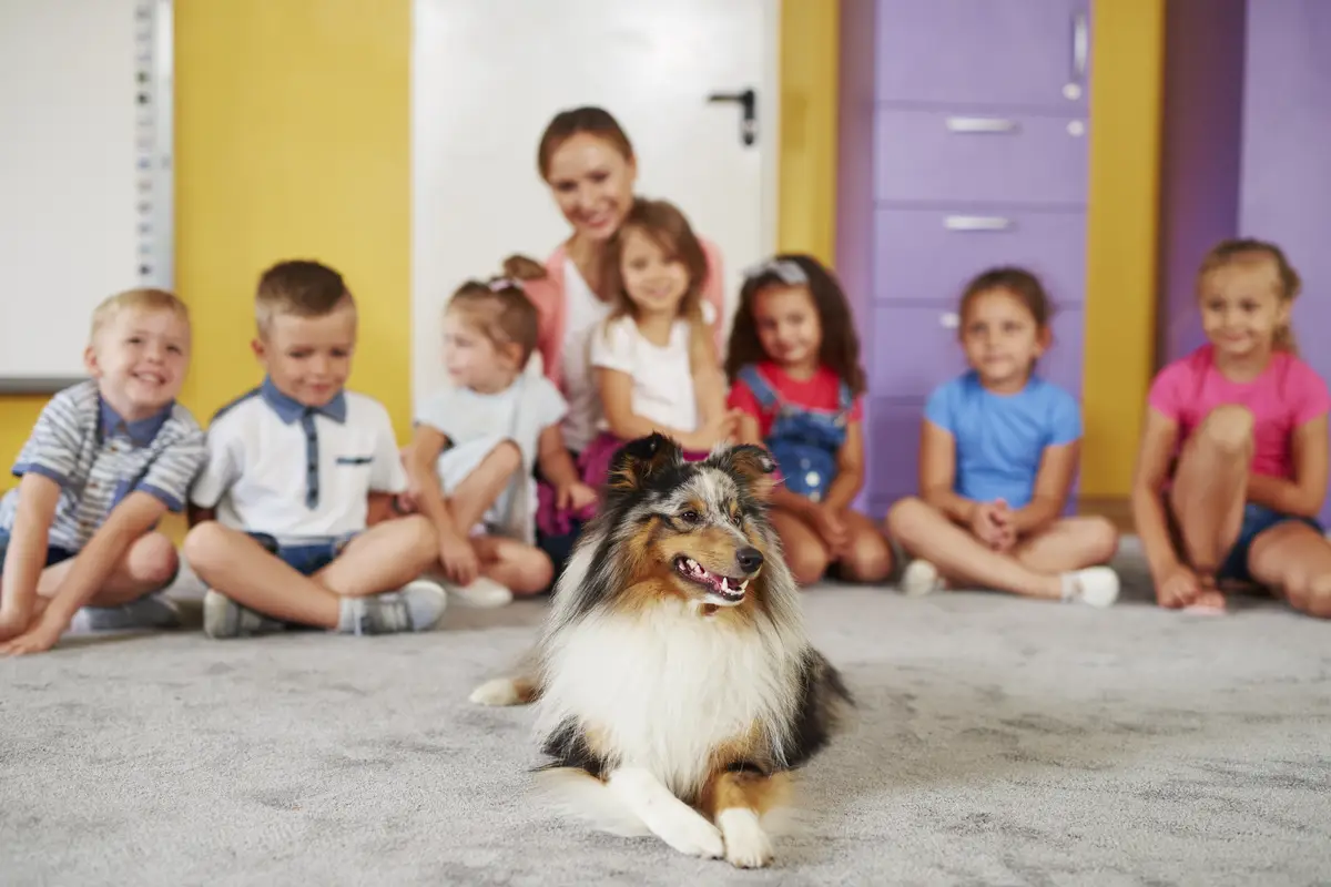 Therapy dog and group of children